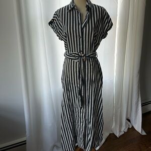Zara medium navy and white striped dress with gold accents and a belt.